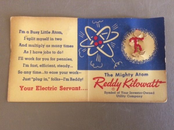 Reddy Kilowatt pin on original card