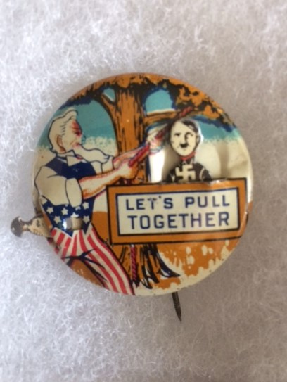 WW II Uncle Sam hanging Hitler pin