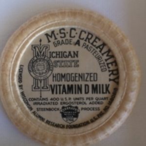 Michigan State Creamery Lid old